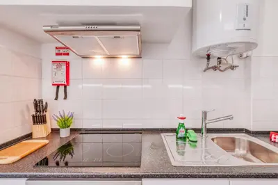 a kitchen with a sink and a counter top at The Millennial Lifestyle Apartment by Amazing Madeira in Funchal