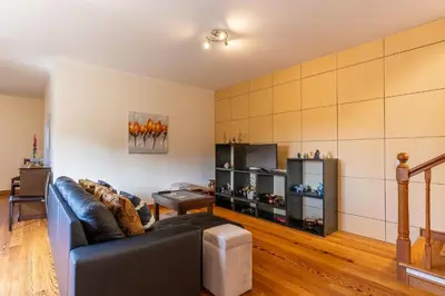 a living room with a couch and a table at Villa Dinis by Holiday Rental Madeira in Calheta