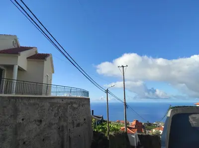 a view of the ocean from a house at Casa AIDA SEA VIEW in Relógio do Poiso