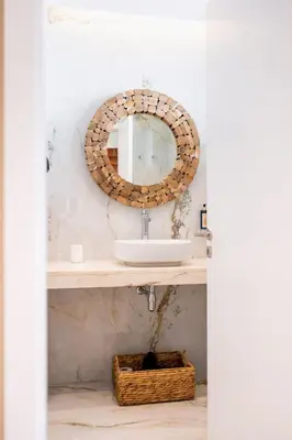 a bathroom with a sink and a mirror at Rooftop Funchal I by Madeira Best Apartments in Funchal