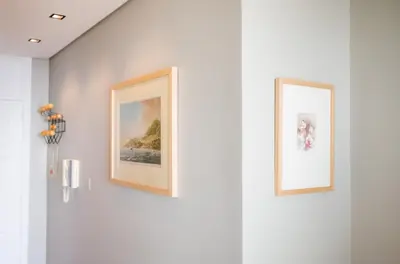 two framed pictures on a wall in a room at Rooftop Funchal I by Madeira Best Apartments in Funchal