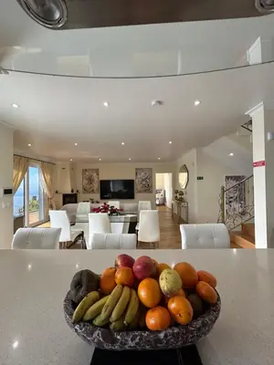 a bowl of fruit on a counter in a living room at Casa Del Mar in Ponta do Sol