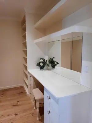 a white bathroom with a sink and a mirror at Casa Del Mar in Ponta do Sol
