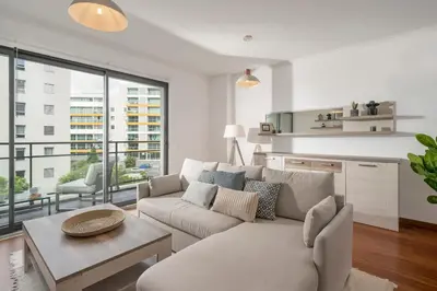 a living room with a couch and a table at Piornais Residence I by An Island Apart in Funchal