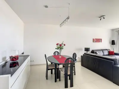 a living room with a table and a couch at Heaven I by LovelyStay in Caniço