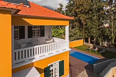 an image of a house with an orange roof at The Yellow House by LovelyStay in Funchal