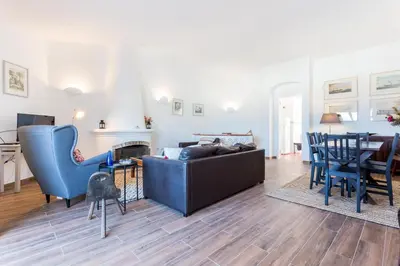 a living room with a couch and chairs and a table at CoolHouses Algarve Luz, 3 Bed Townhouse w/ beautiful sea view, Luz Bay 76 in Luz