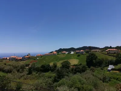 a view of a small village on a hill at Casa do Curral Velho in Santana