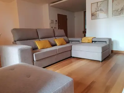 a living room with a couch and two chairs at Peaceful Apartment in Funchal