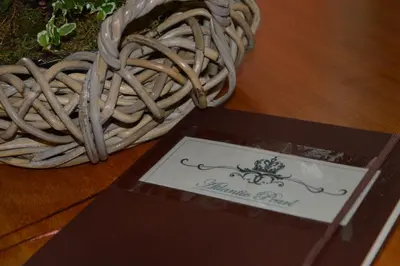 a box sitting on a table next to a basket at Peaceful Apartment in Funchal