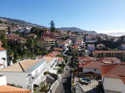 an aerial view of a city with buildings at Panoramic View Apartment in Funchal