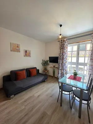 a living room with a couch and a table at Atlantic Studios #03 in Funchal