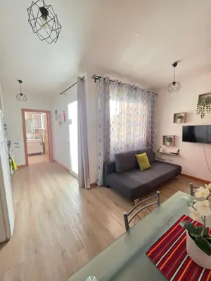 a room with a table and chairs and a bed at Atlantic Studios #02 in Funchal