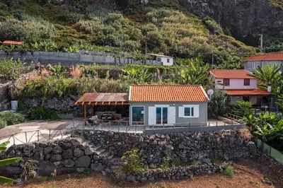 a house on the side of a mountain at Casa da Rocha de Baixo by An Island Apart in Santana