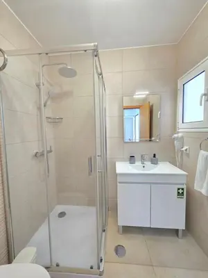 a bathroom with a shower and a sink at Atlantic Studios #01 in Funchal