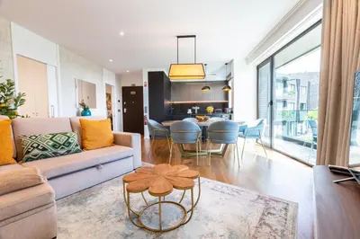 a living room with a couch and a table at Banana Lodge by Atlantic Holiday in Funchal