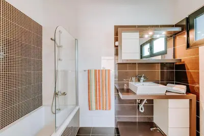 a bathroom with a sink and a shower at La Madérene with Pool by Stay Madeira Island in Tábua