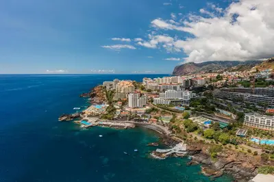 an aerial view of a resort on the ocean at Funchal Sea View I by An Island Apart in Funchal