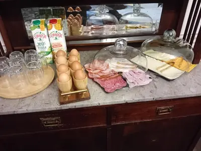 a counter with eggs and other ingredients on it at Casa Das Videiras in Seixal