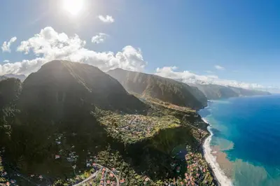 an aerial view of a mountain next to the ocean at Casa dos Terços by An Island Apart in São Vicente