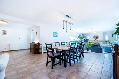 a dining room with a table and chairs at Casa dos Sonhadores in Aljezur
