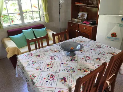 a kitchen with a table with a plate on it at Terra Chã Cottage,FEEL Home, in São Vicente