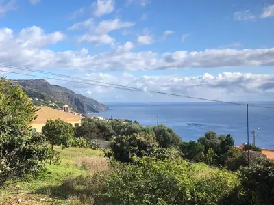 a view of the ocean from a hill at Calheta Ocean View Apartments 1 - Air Condition in Estreito da Calheta