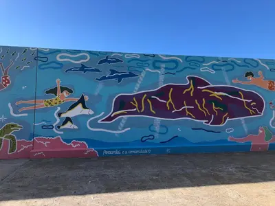 a mural on the side of a wall with a dolphin and animals at Calheta Ocean View Apartments 1 - Air Condition in Estreito da Calheta