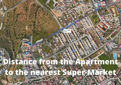 a map with the distance from the apartment to the nearest super market at Spacious Apartment near Porto de Mos Beach, Lagos. in Lagos