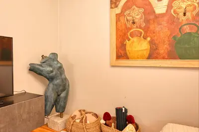 a statue of a bear on a table in a room at Villa Santa Madalena, a Home in Madeira in Arco da Calheta