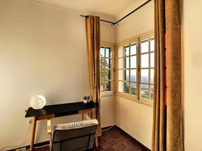 a room with a desk and a window at Casa Bergmann by LovelyStay in Funchal