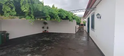 a courtyard of a house with a bunch of green vines at Casa Alencastre in Funchal