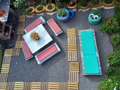 an overhead view of a table and a surfboard on the ground at Tabua Village Madeira Suite VIP in Ribeira Brava