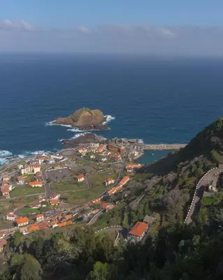 an aerial view of a small island in the ocean at Casa Azul - Ocean View in Porto Moniz