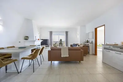 a living room with a couch and a table at CoolHouses Algarve Luz , 2 Bed apartment w/ sea view, Blue Ocean View (4972/AL) in Luz