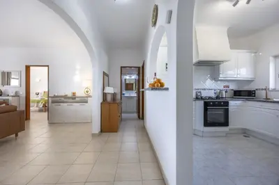 a living room with two couches and a fireplace at CoolHouses Algarve Luz , 2 Bed apartment w/ sea view, Blue Ocean View (4972/AL) in Luz