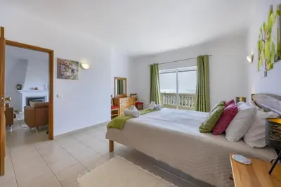 a plate of oranges on a kitchen counter with wine glasses at CoolHouses Algarve Luz , 2 Bed apartment w/ sea view, Blue Ocean View (4972/AL) in Luz