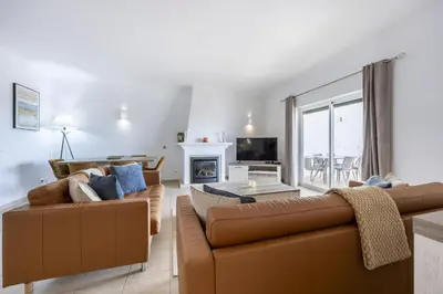 a balcony with chairs and a view of the ocean at CoolHouses Algarve Luz , 2 Bed apartment w/ sea view, Blue Ocean View (4972/AL) in Luz