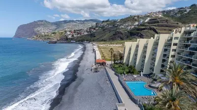 a balcony with a view of the ocean at Atlantic Edge - Relaxing Beachfront Escape Formosa in Funchal