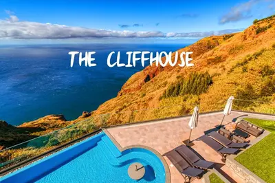 a view of the cliff house overlooking the ocean at The Cliffhouse by LovelyStay in Fajã da Ovelha