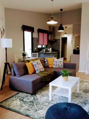 a living room with a couch and a table at Anjos's Choice in Ponta do Sol