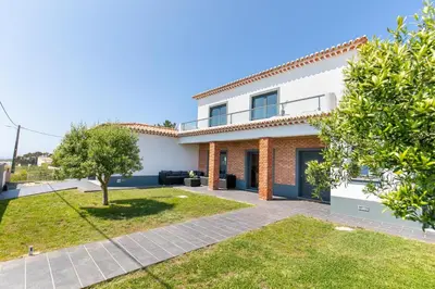 a villa with a view of the garden at Casa Amizade in Aljezur