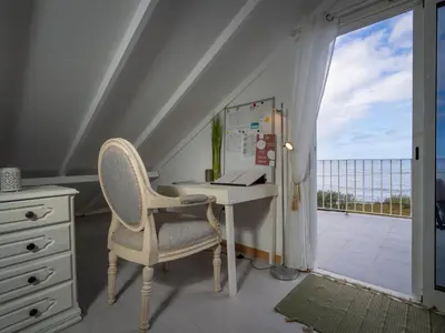 an open refrigerator with a sink and a sink at Ocean Garden, 4 units by the ocean in São Vicente