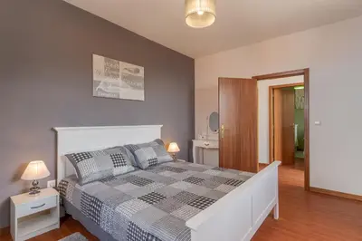 a balcony with chairs and a view of the ocean at Villa Rosa with private pool by Holiday Rental Madeira in Ribeira Brava