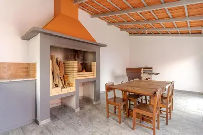 a staircase in a home with a window and a vase at Villa Rosa with private pool by Holiday Rental Madeira in Ribeira Brava