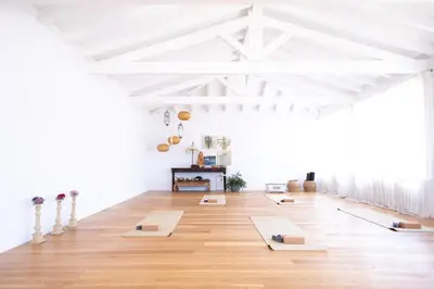 a room with yoga mats on the floor at Moinho Calmo in Vila do Bispo