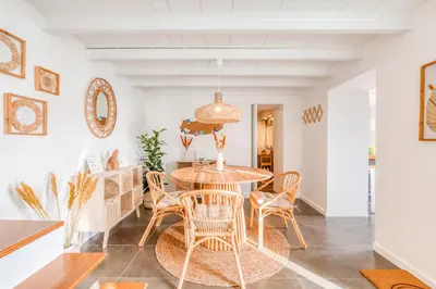 a dining room with a table and chairs at The Hideaway Madeira in Prazeres