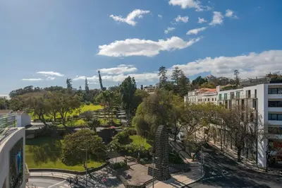 a view of a park with trees and buildings at The Mountain Apartment by An Island Apart in Funchal