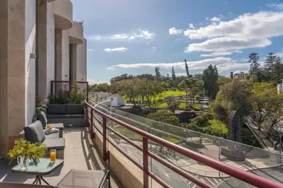 a balcony with a view of a park at The Mountain Apartment by An Island Apart in Funchal