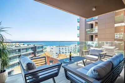 a balcony with a view of the ocean at Maha by KAAMAH - 2 Bedroom OceanView Designer Apartment in Funchal
